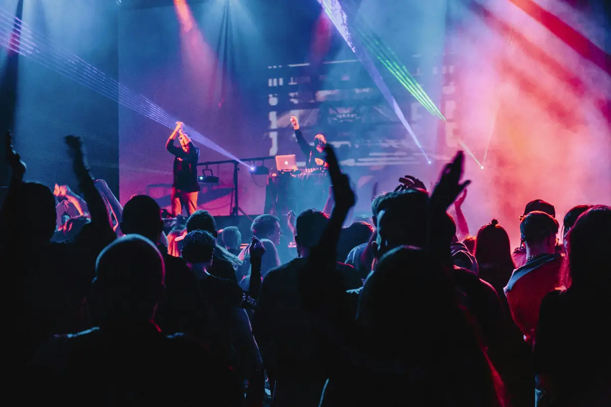 woman singing on stage