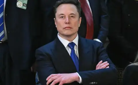 Elon Musk Compares DOGE to Buddhism, Calls It “A Way of Life”