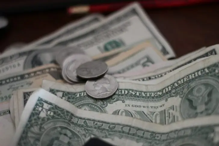 Is burning money illegal?